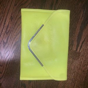 Neon yellow BCBG clutch